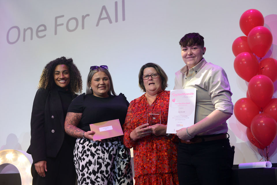 Winner, One For All, presented with their award